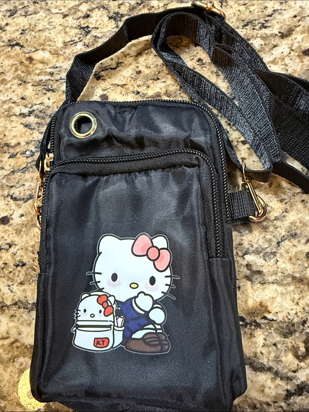Hello Kitty Black Crossbody Phone Pouch with Pink Bow Graphic